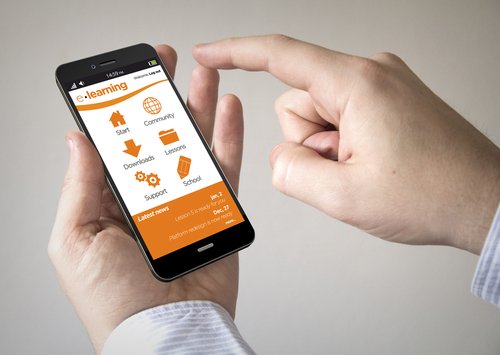 Close,Up,Of,Man,Using,3d,Generated,Mobile,Smart,Phone Micro / Mobile Learning